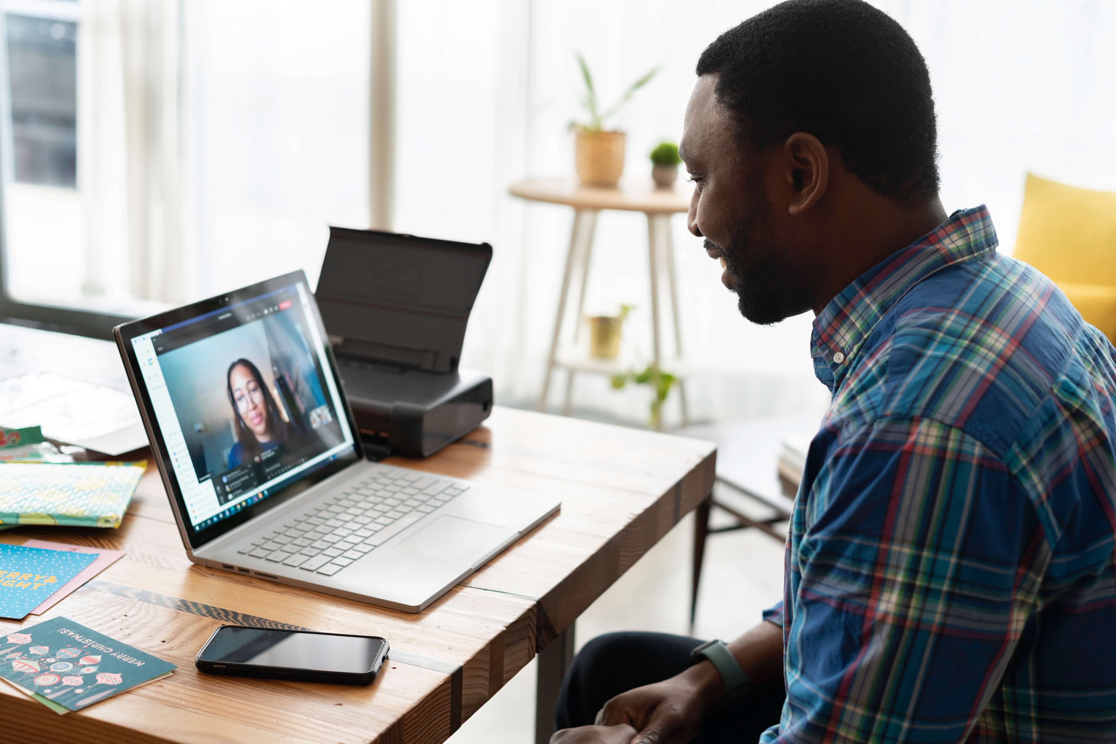 man on video call in the hybrid workplace